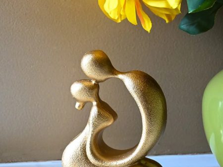 Elegant Golden Resin Romantic Abstract Kiss Figurine | 4 x 2 x 5 inches For Sale